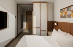 Administrativní brutalistickou budovu v americkém New Haven proměnili architekti ze studia Becker + Becker na luxusní hotel Marcel