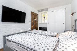 Rekonstrukce interiéru kamenné chalupy od 3K Architects