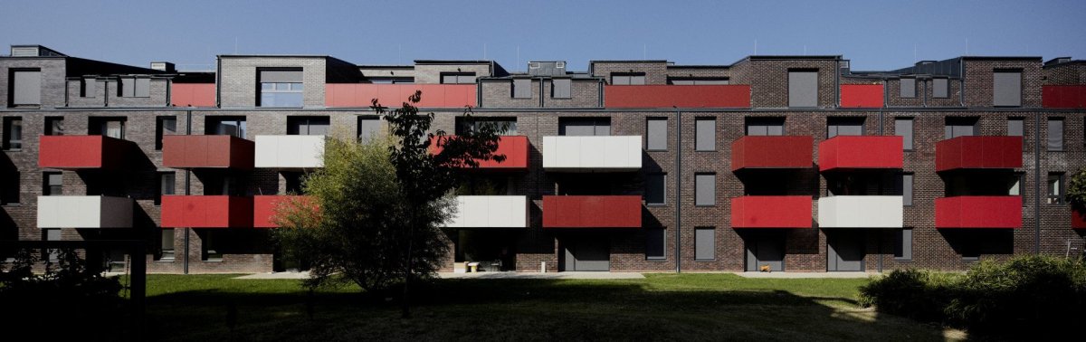 Studio T2.a Architects proměnilo cihlovou budovu mlýnů na okraji Budapešti na moderní loftové byty