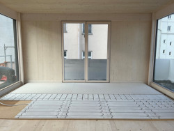 Deska pro podlahové vytápění fermacell® Therm25 je navržena pro systém suché podlahy s integrovaným vedením trubek podlahového vytápění či chlazení – zde se budou využívat obě funkce.