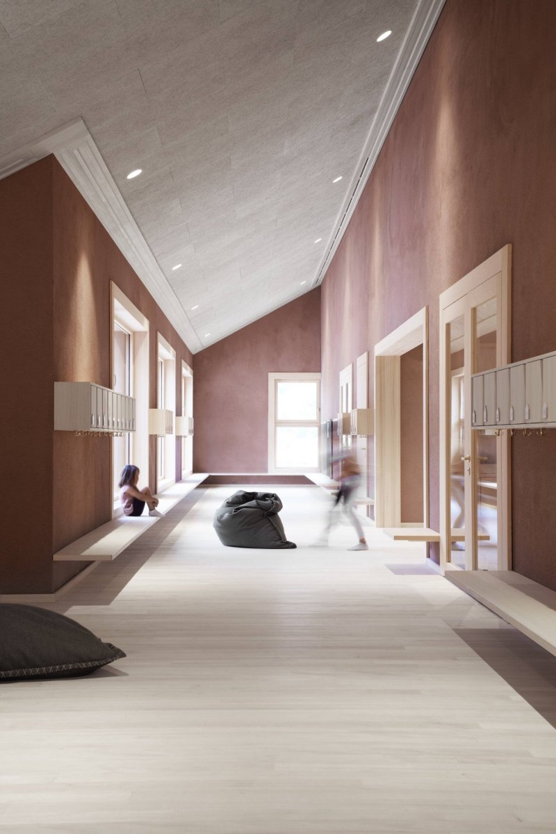 Padevilla architects - Vzdělávací centrum v malé rakouské obci: V budově se nachází školka, škola a  zařízení péče o děti