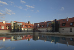 Ateliér AU plan zrekonstruoval Jinonický dvůr. Vznikly zde byty s dotekem historie.