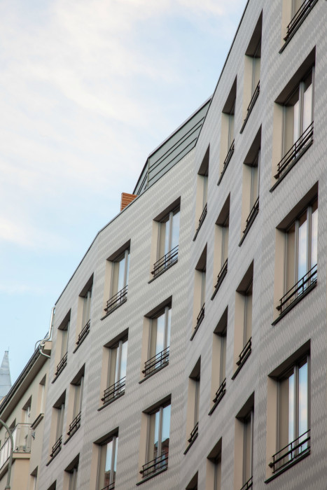 Bytový dům Sámova, Znamení čtyř - architekti