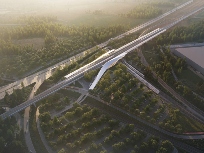 Hala kopíruje linii trati, vše je vkomponováno do okolní krajiny.