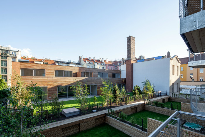 Bytový dům Sámova, Znamení čtyř - architekti