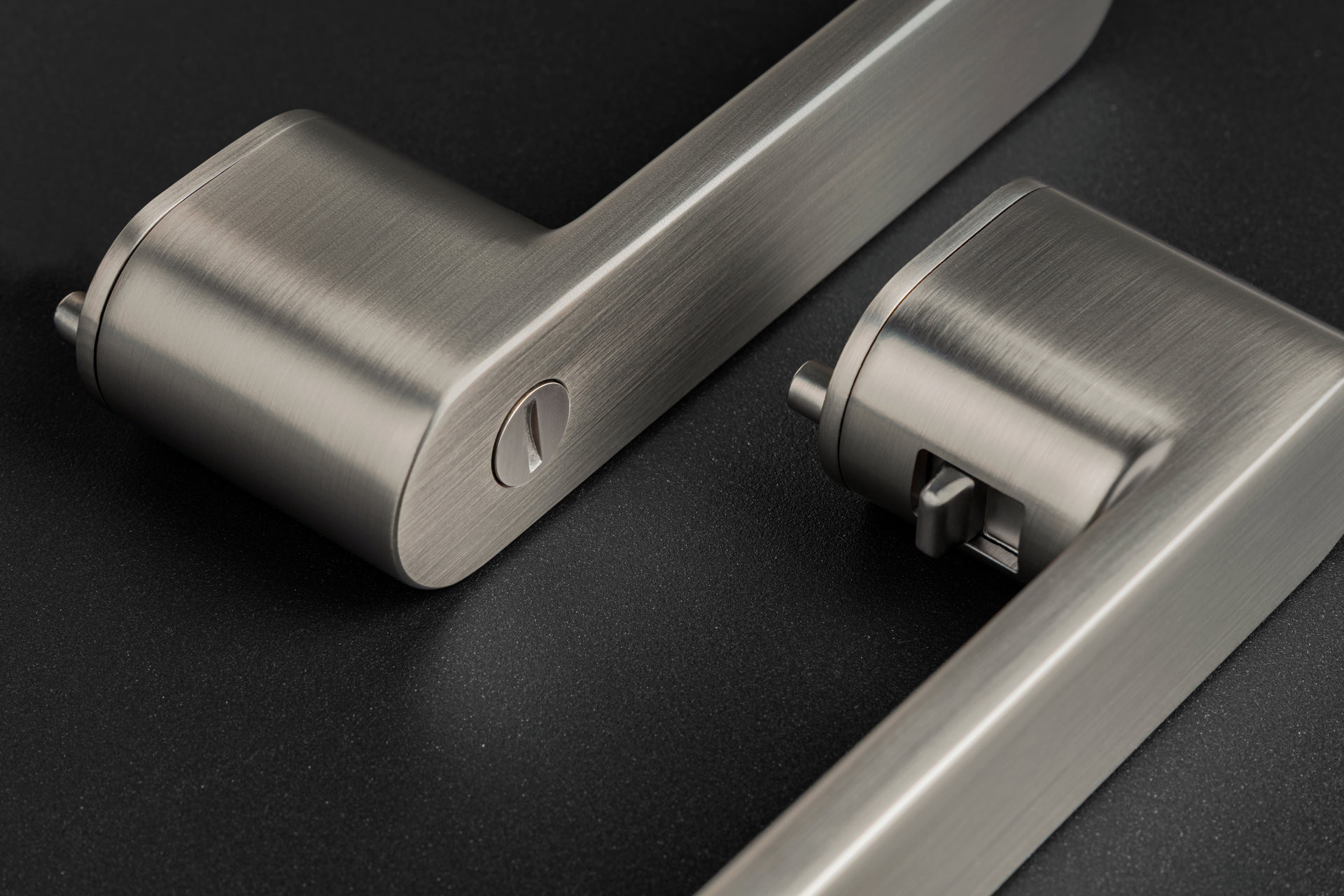 MPK Impressa Switch Lock - interiérová klika s integrovaným uzamykáním