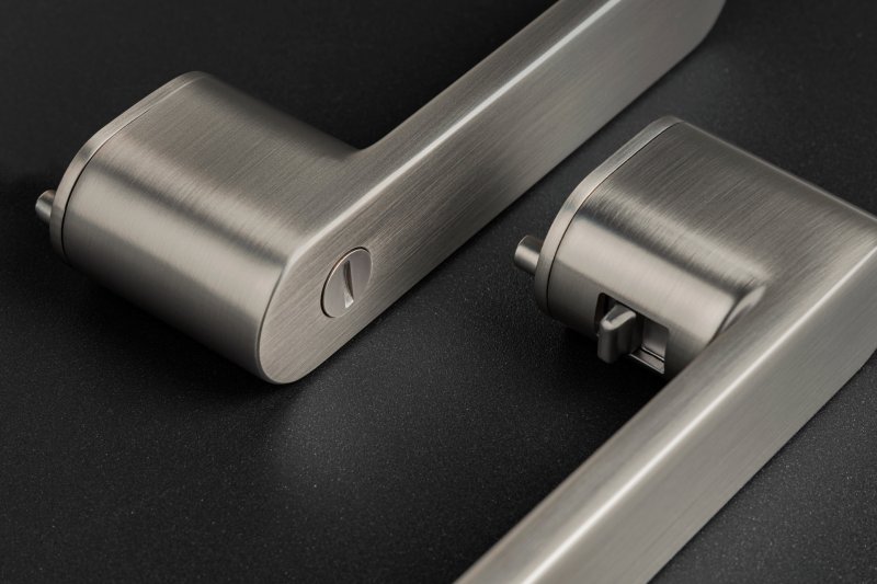 MPK Impressa Switch Lock - interiérová klika s integrovaným uzamykáním