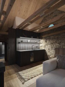Interiér podkroví pracuje se syrovými materiály, tlumeným světlem a přiznanými konstrukcemi. (Chalupa na Vysočině; Plus One Architects)